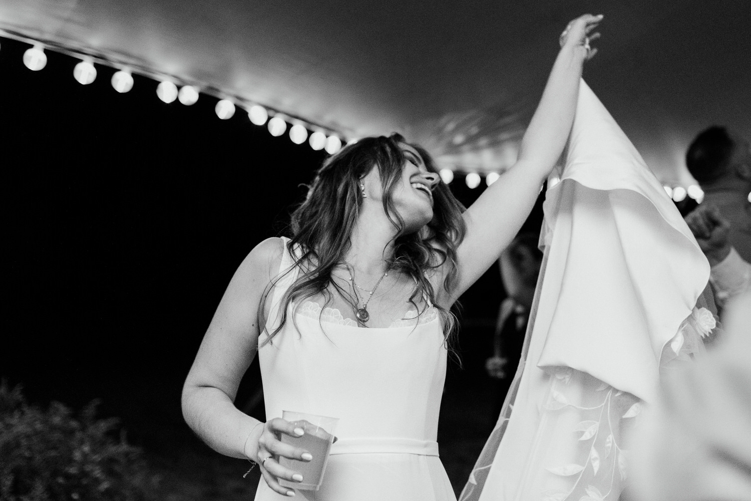 Bride dancing at Orr's Island, Maine wedding.