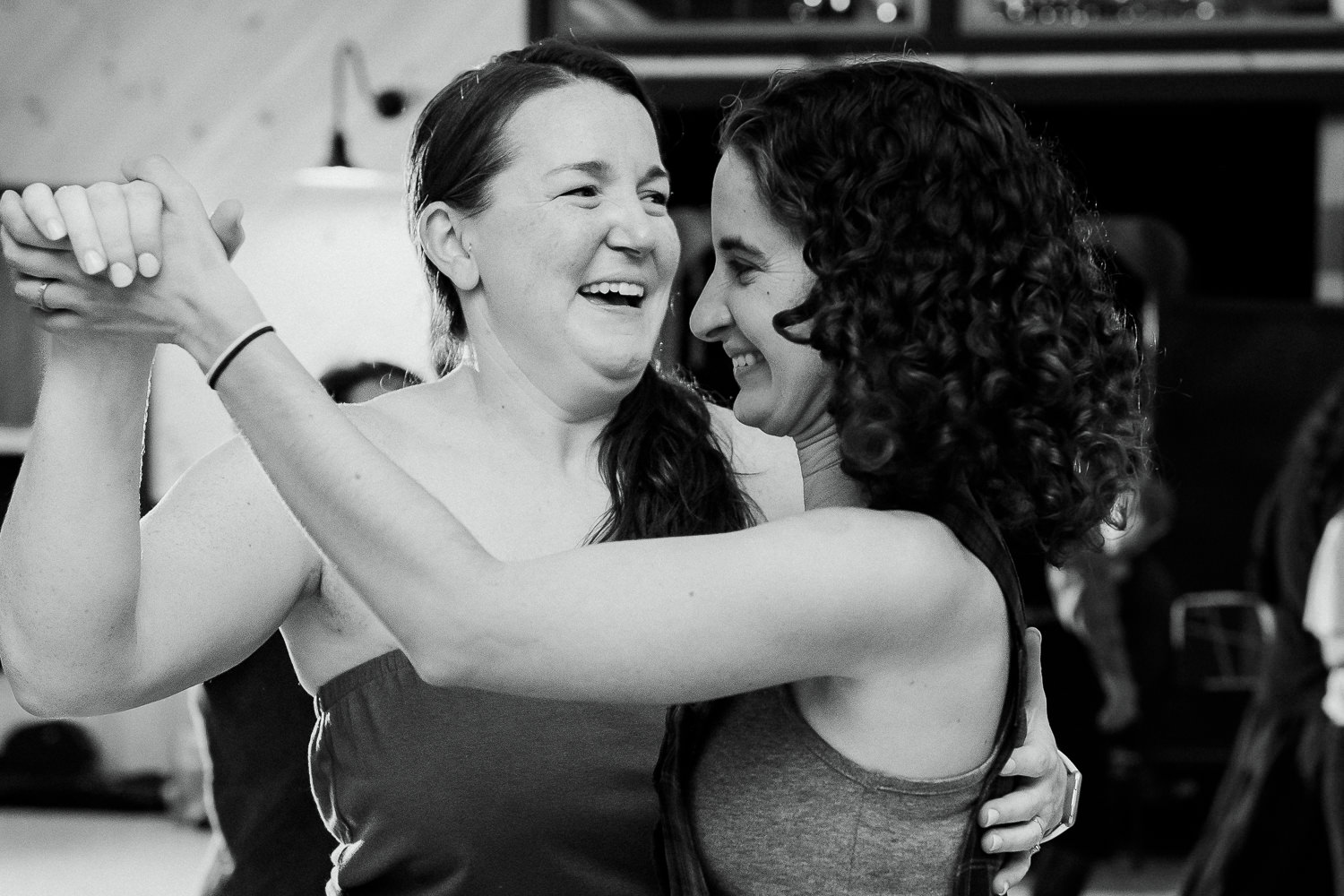bride contra dancing with a friend
