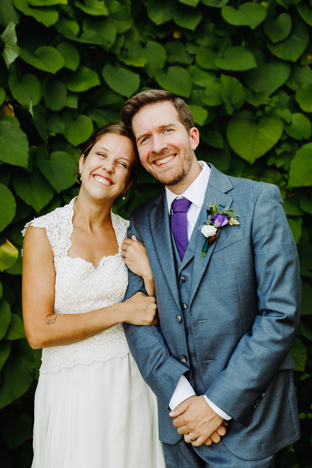 Bride and groom smiling together at Sutton Island and Bar Harbor Maine wedding