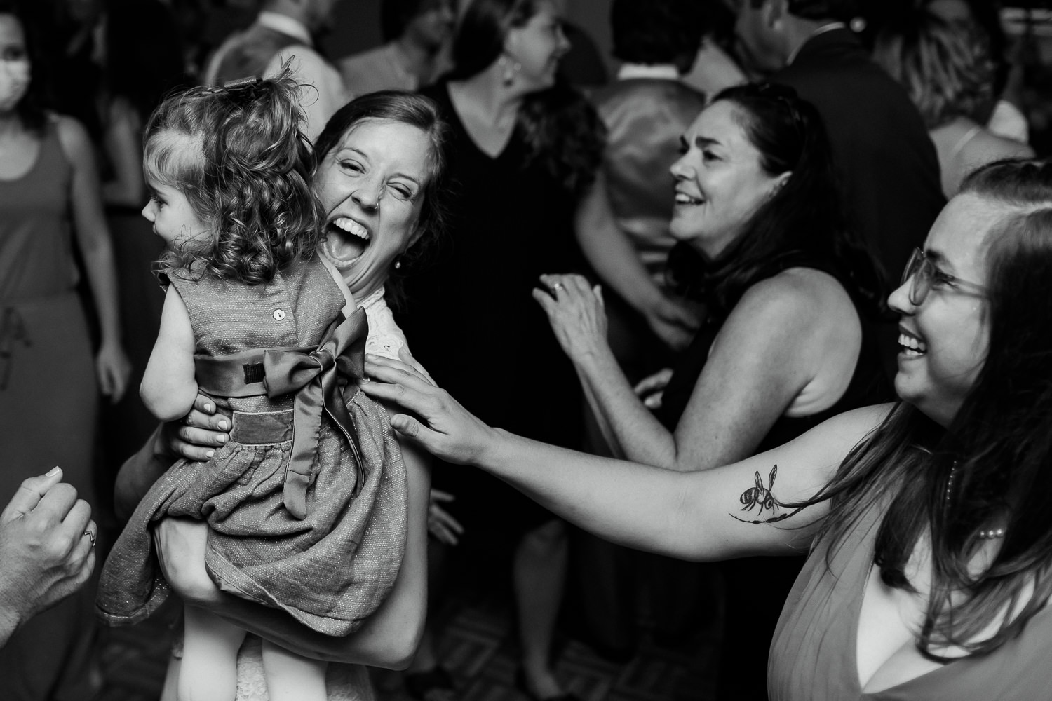 bride dancing with her niece at Sutton Island and Bar Harbor Maine Wedding