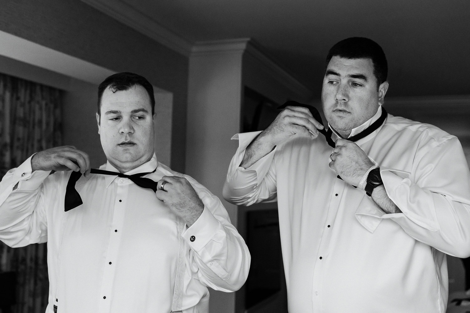 Groom and groomsman at Stage Neck Inn wedding in York Maine