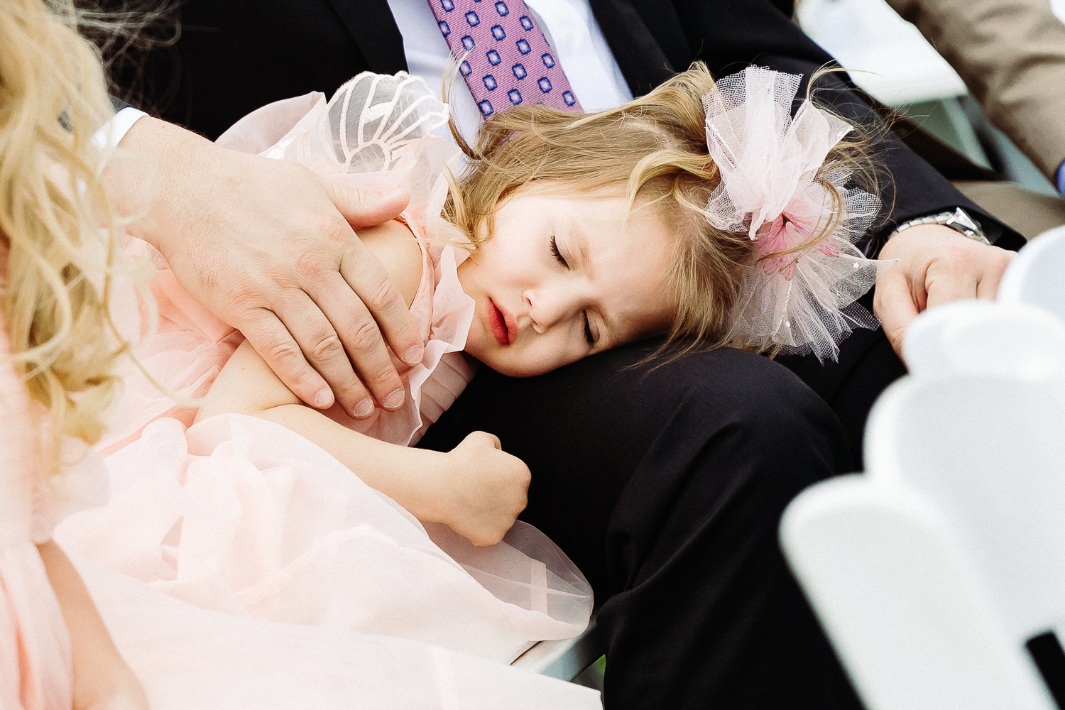 little girl sleeping at Boothbay Harbor Maine wedding at Linekin Bay Resort