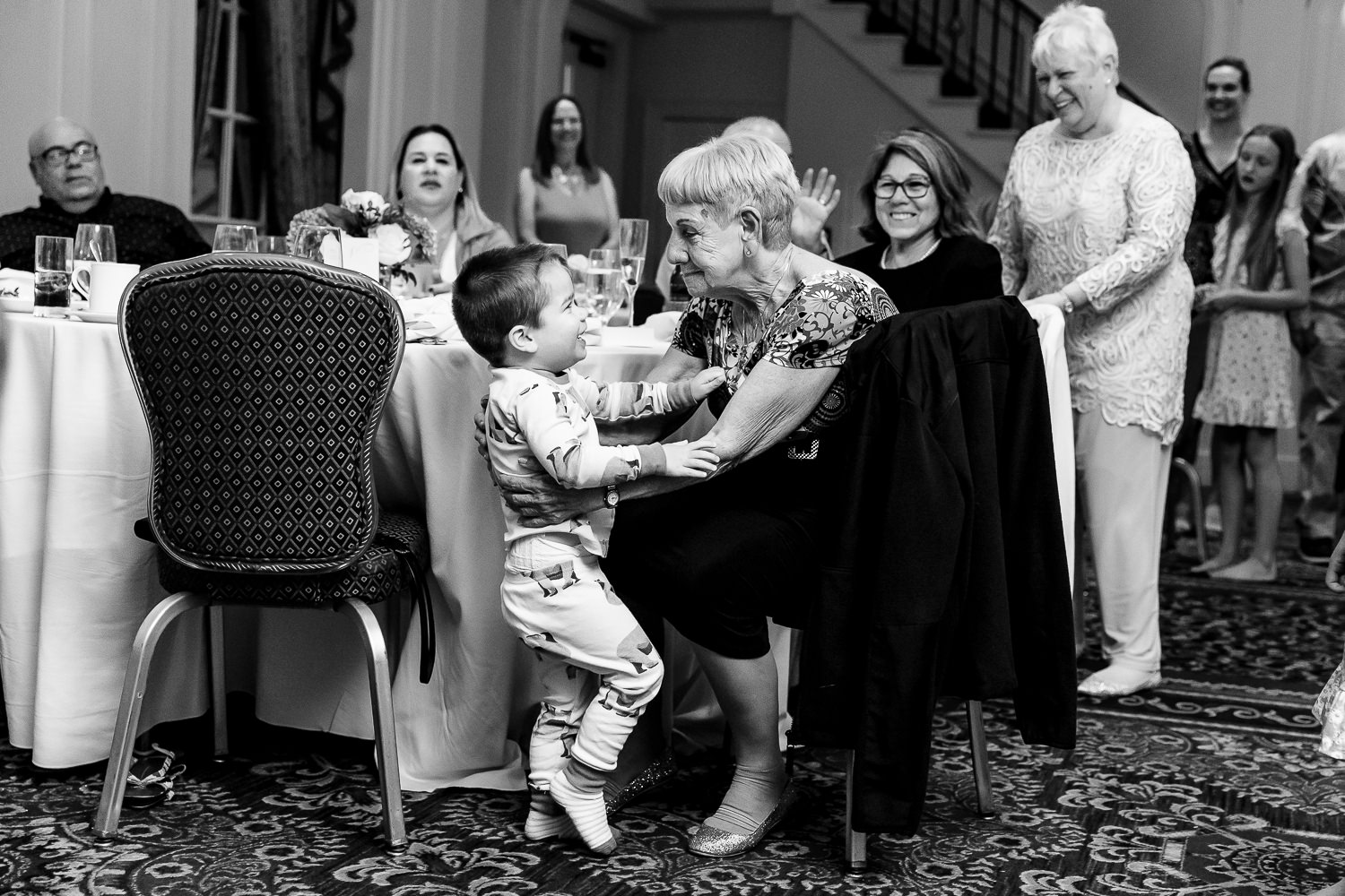 grandmother and child at New Castle NH wedding celebration