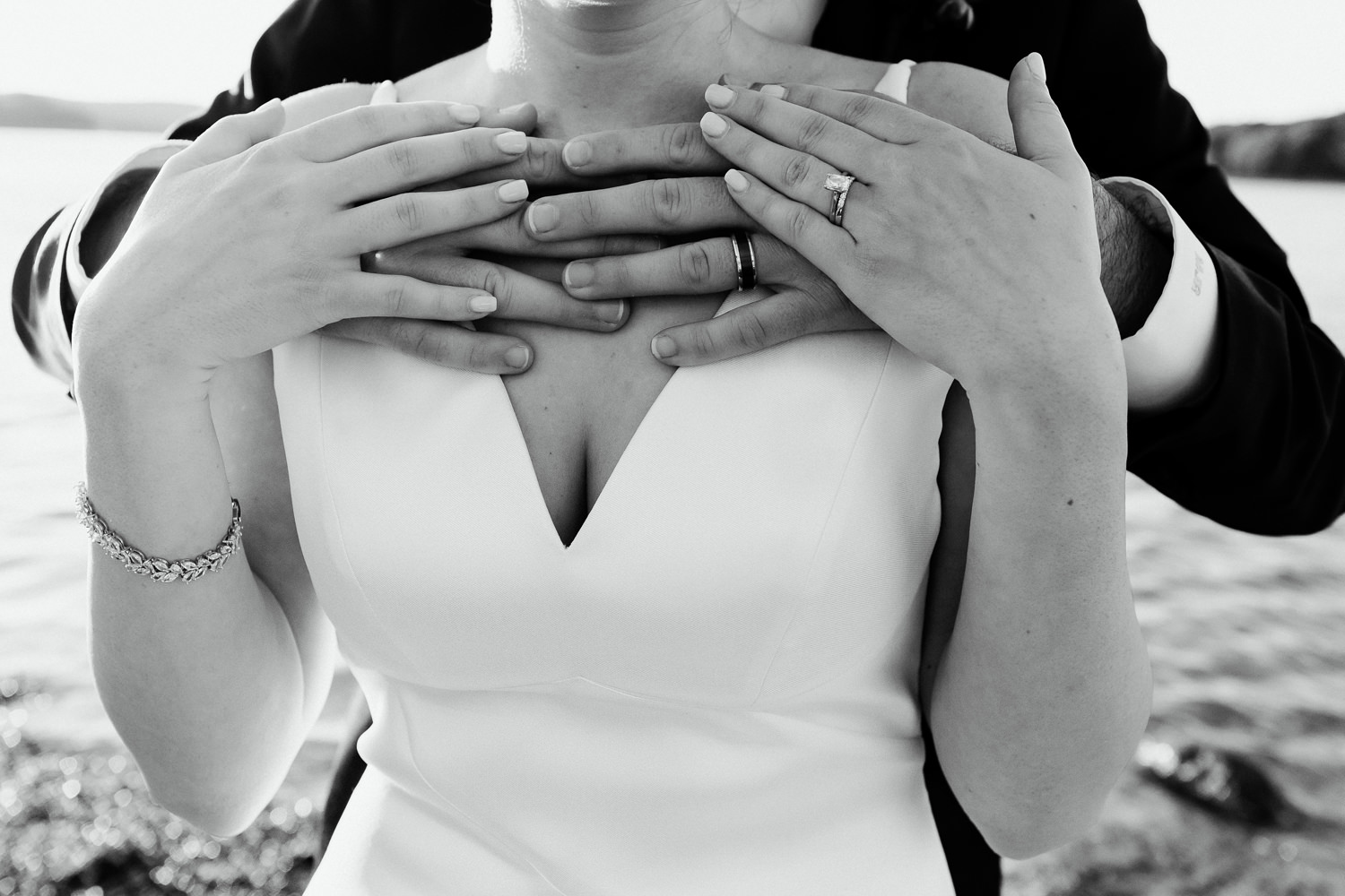 rings on bride and groom's hands at Bar Harbor wedding