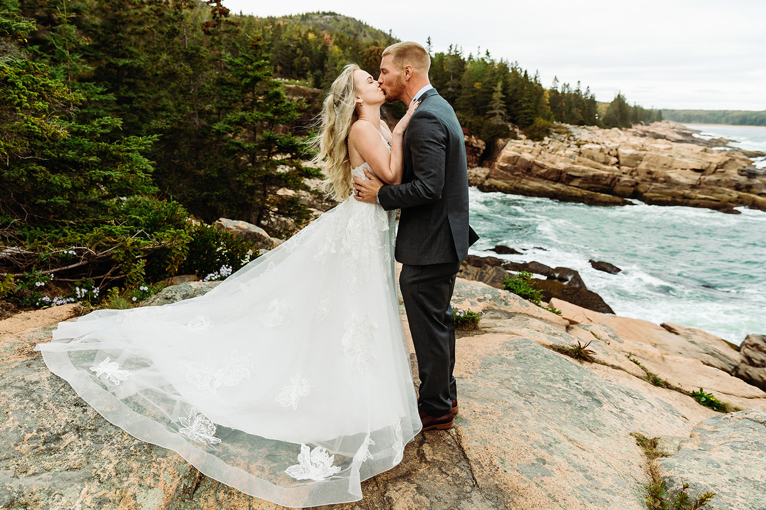 First kiss during fall elopement in Acadia National Park