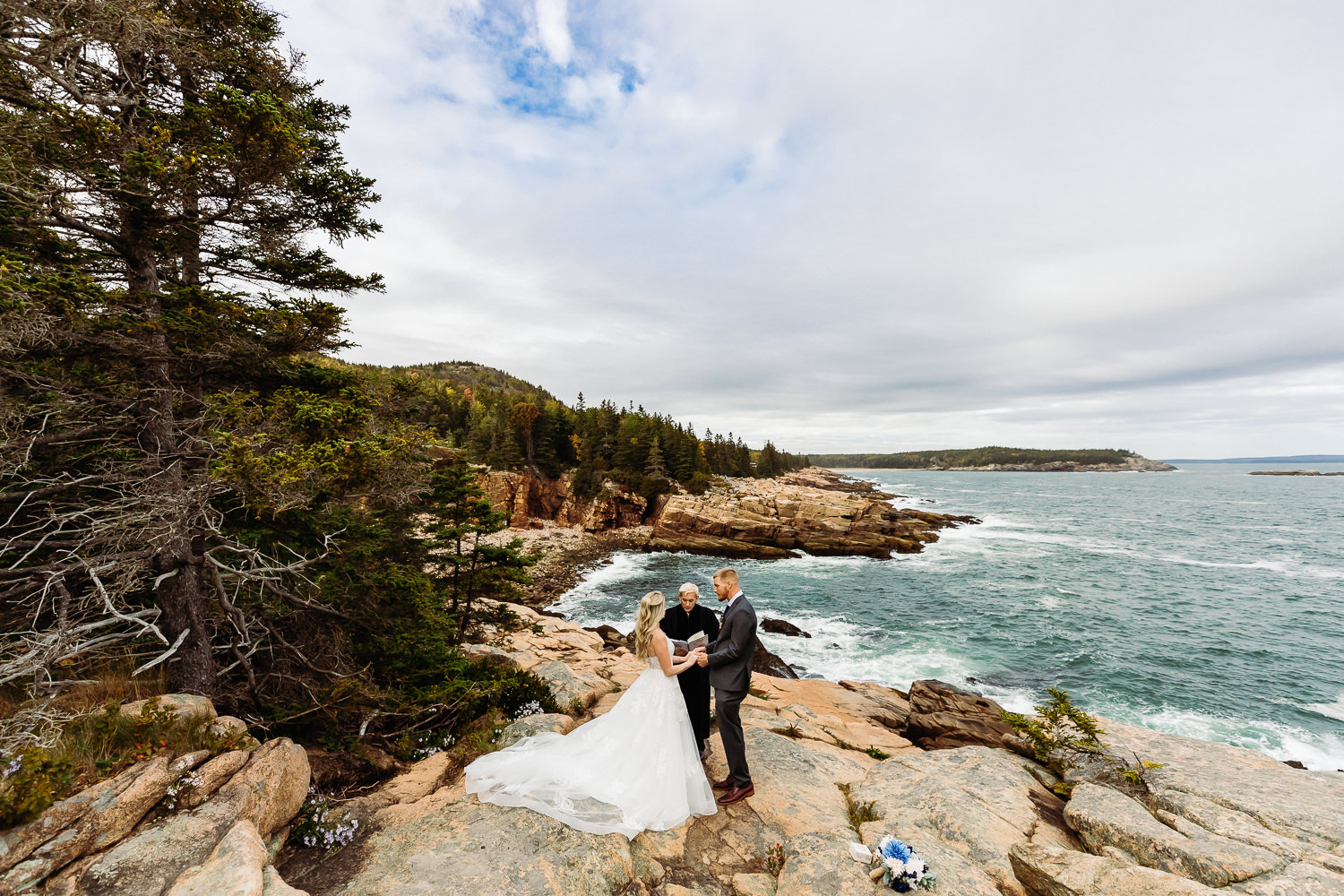 wedding ceremony during fall elopement in Acadia National Park