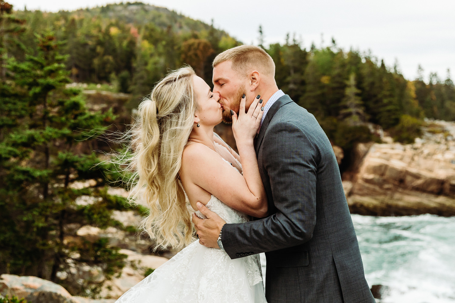first kiss during fall elopement in Acadia National Park