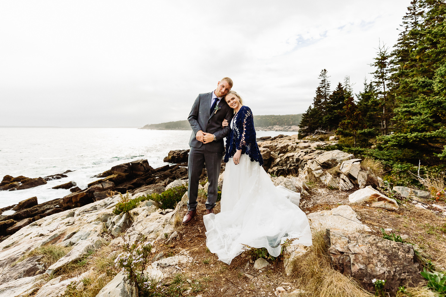 wedding portrait on cliffs during fall elopement in Acadia National Park