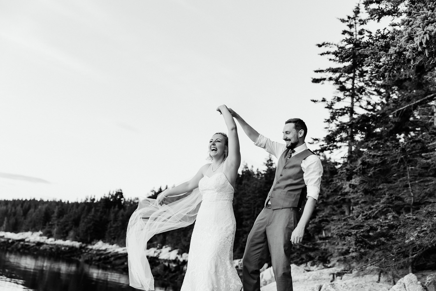 wedding portrait at sunset during wedding toast at Swan's Island Maine wedding