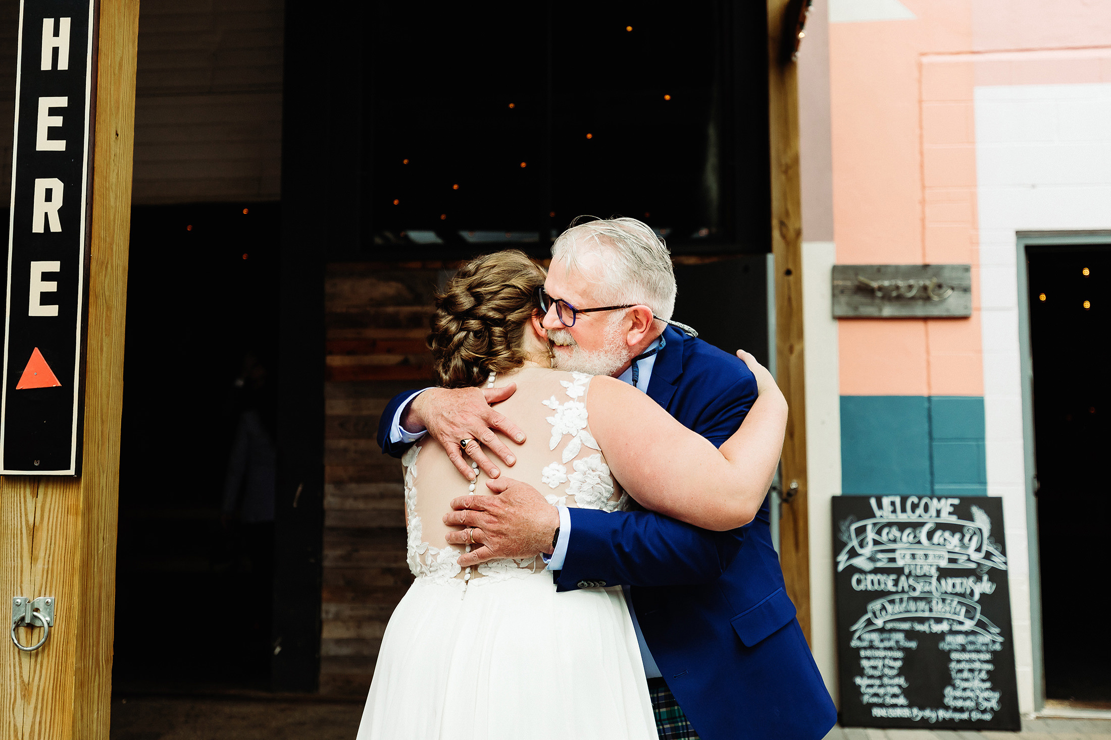Bride hugging her father during Bar Harbor wedding