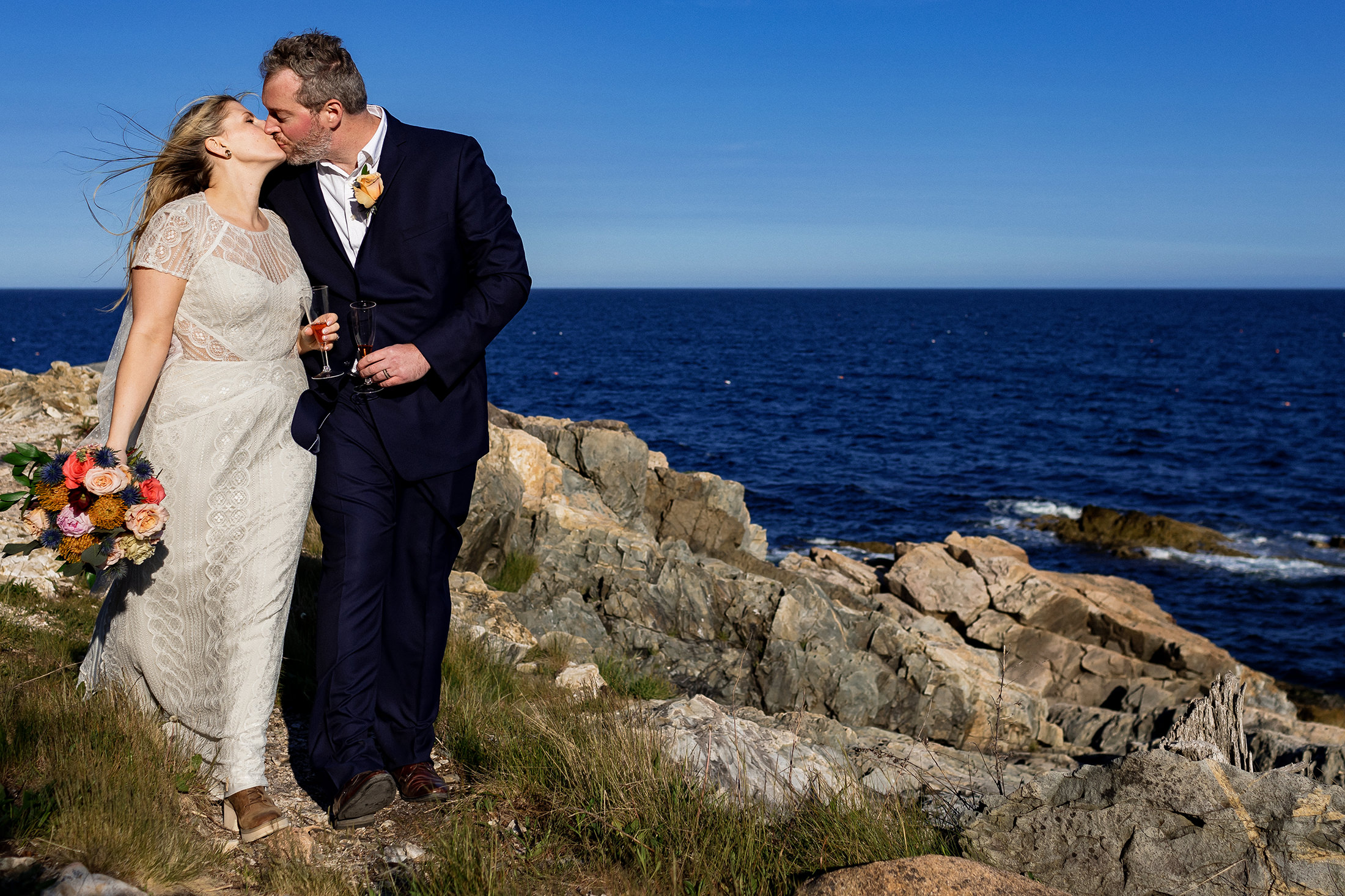 bride and groom kissing after Otter Point Acadia elopement