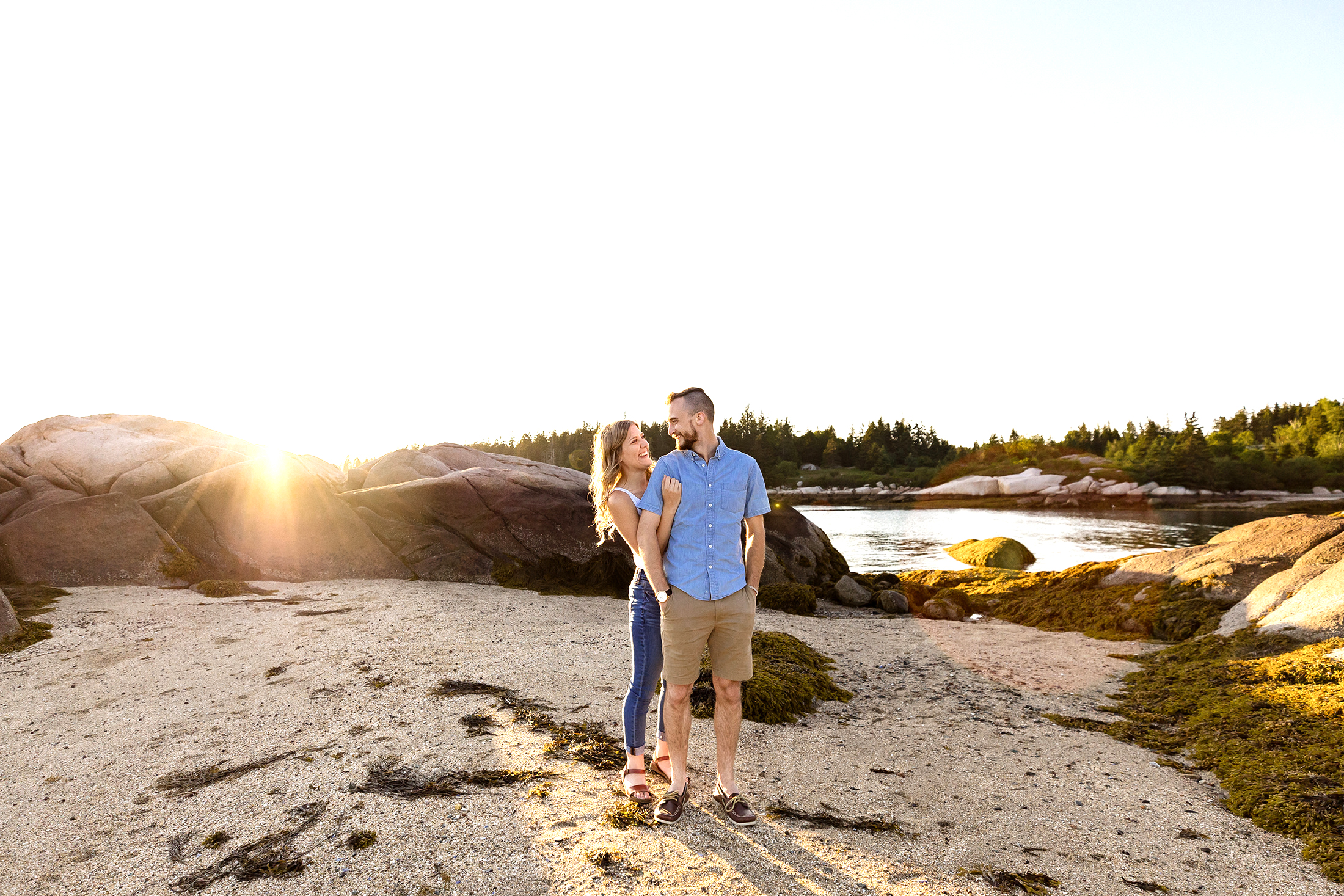 engaged couple on Stonington Maine beach