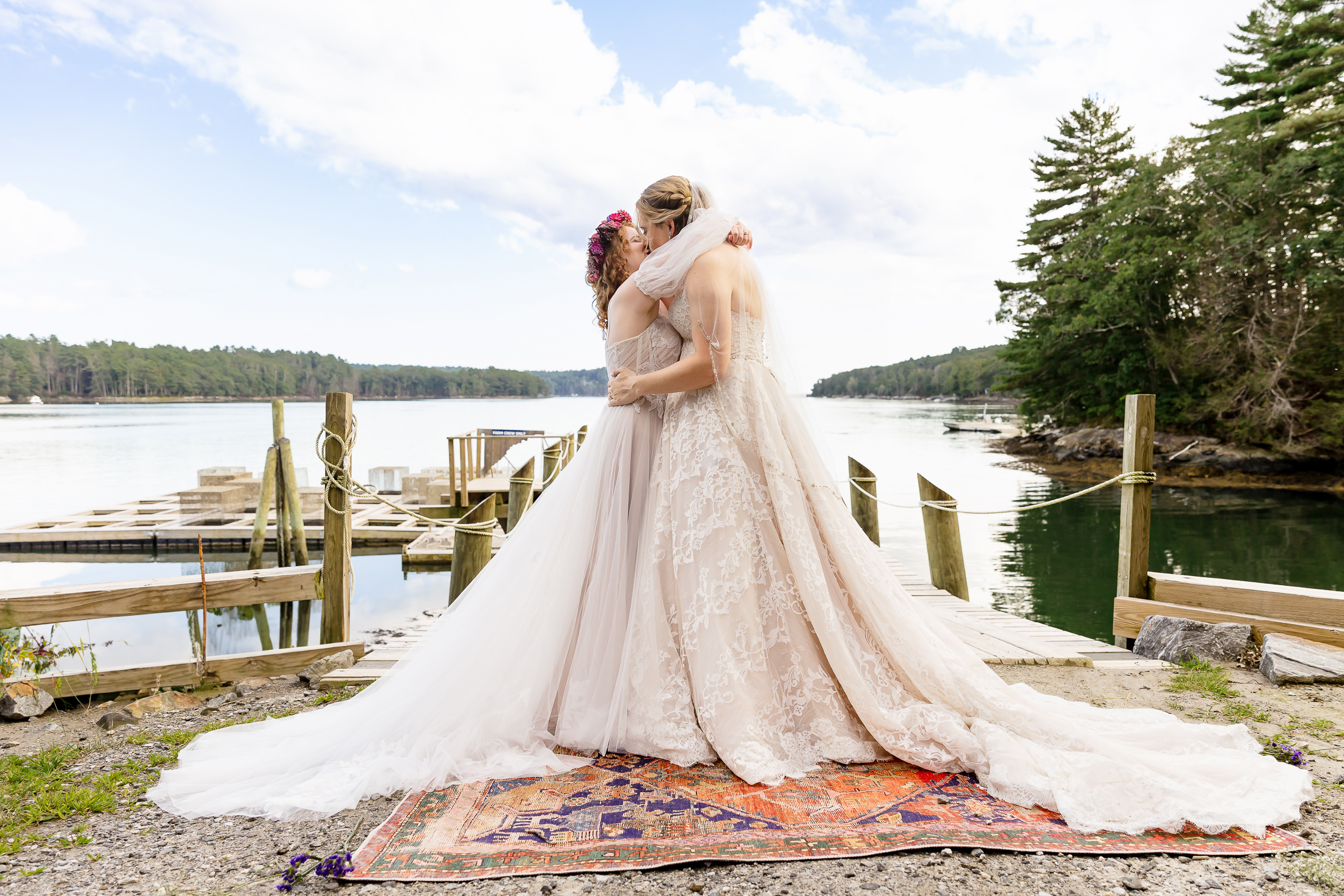 first kiss at Edgecomb Maine wedding at Glidden Point Oyster Farms