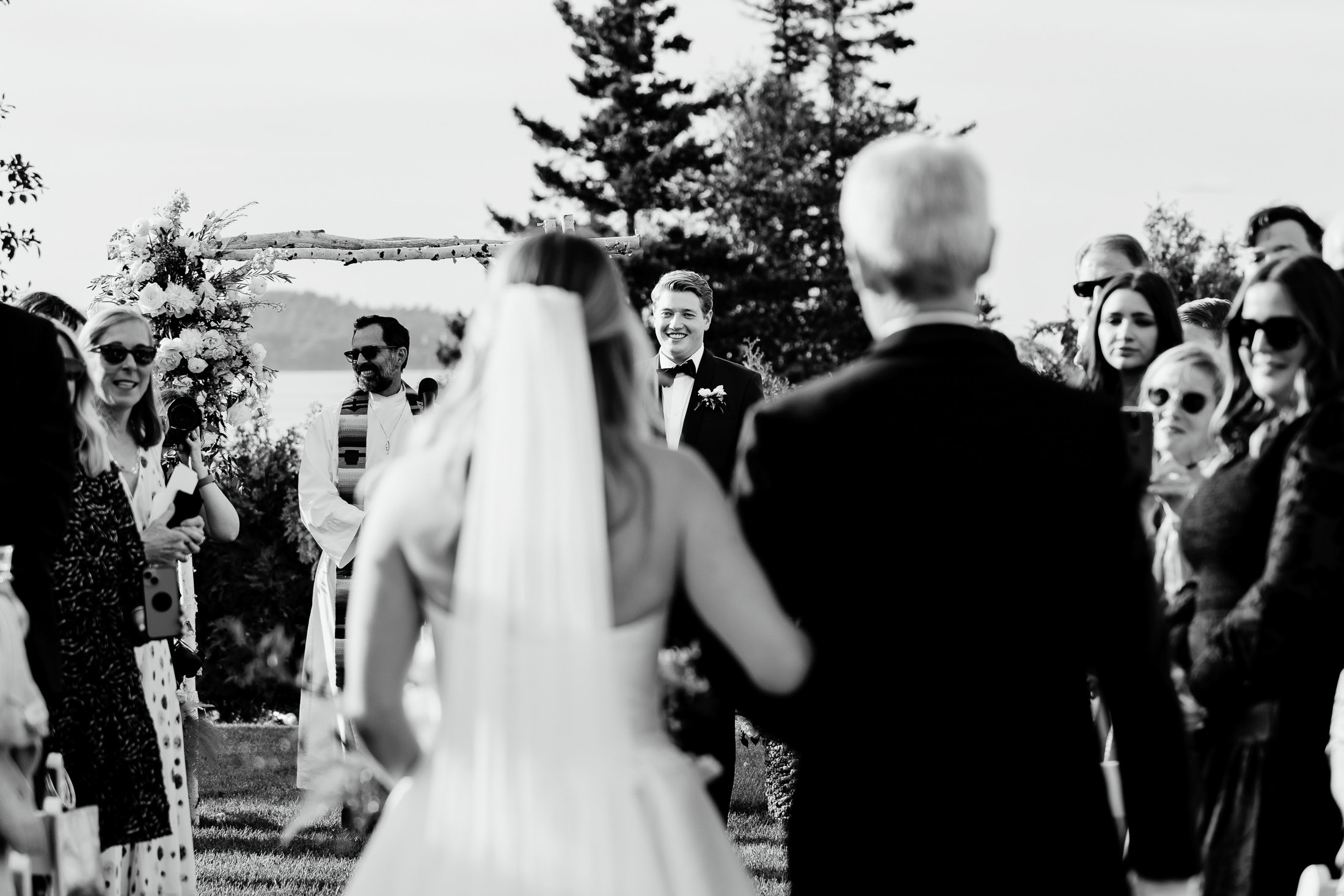 groom's reaction to bride coming down the aisle during wedding on MDI