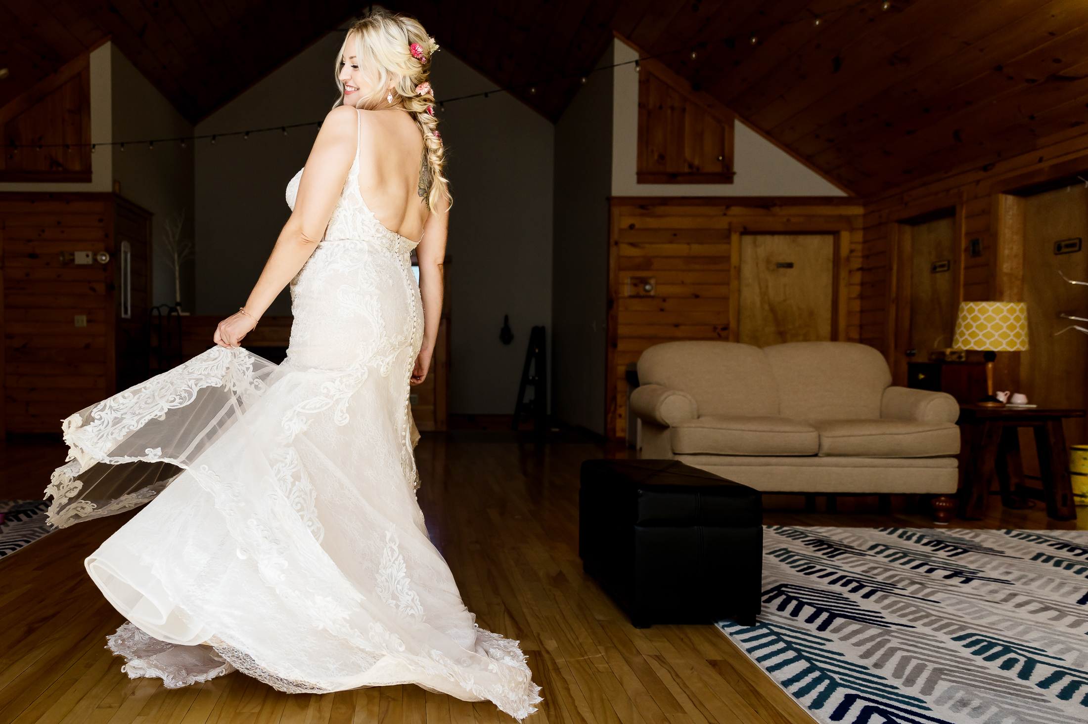 bride twirling during Caratunk Maine wedding at Maine Lakeside Cabins