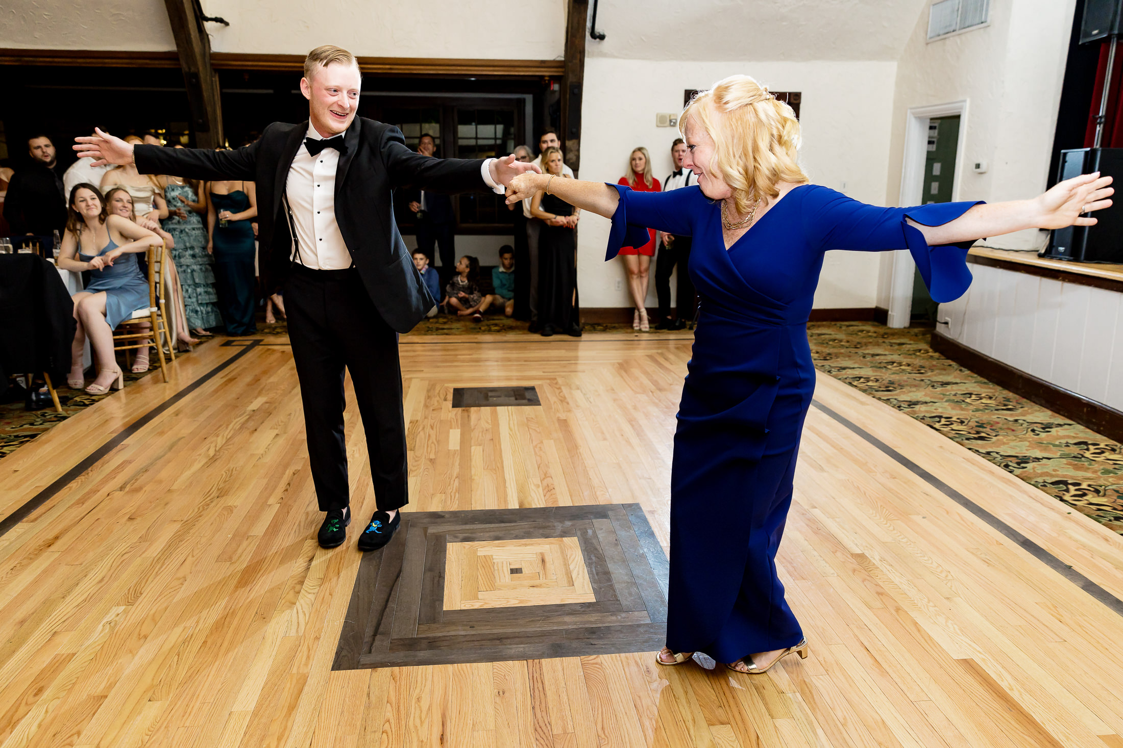 mother-son dance at stormy Bar Harbor wedding