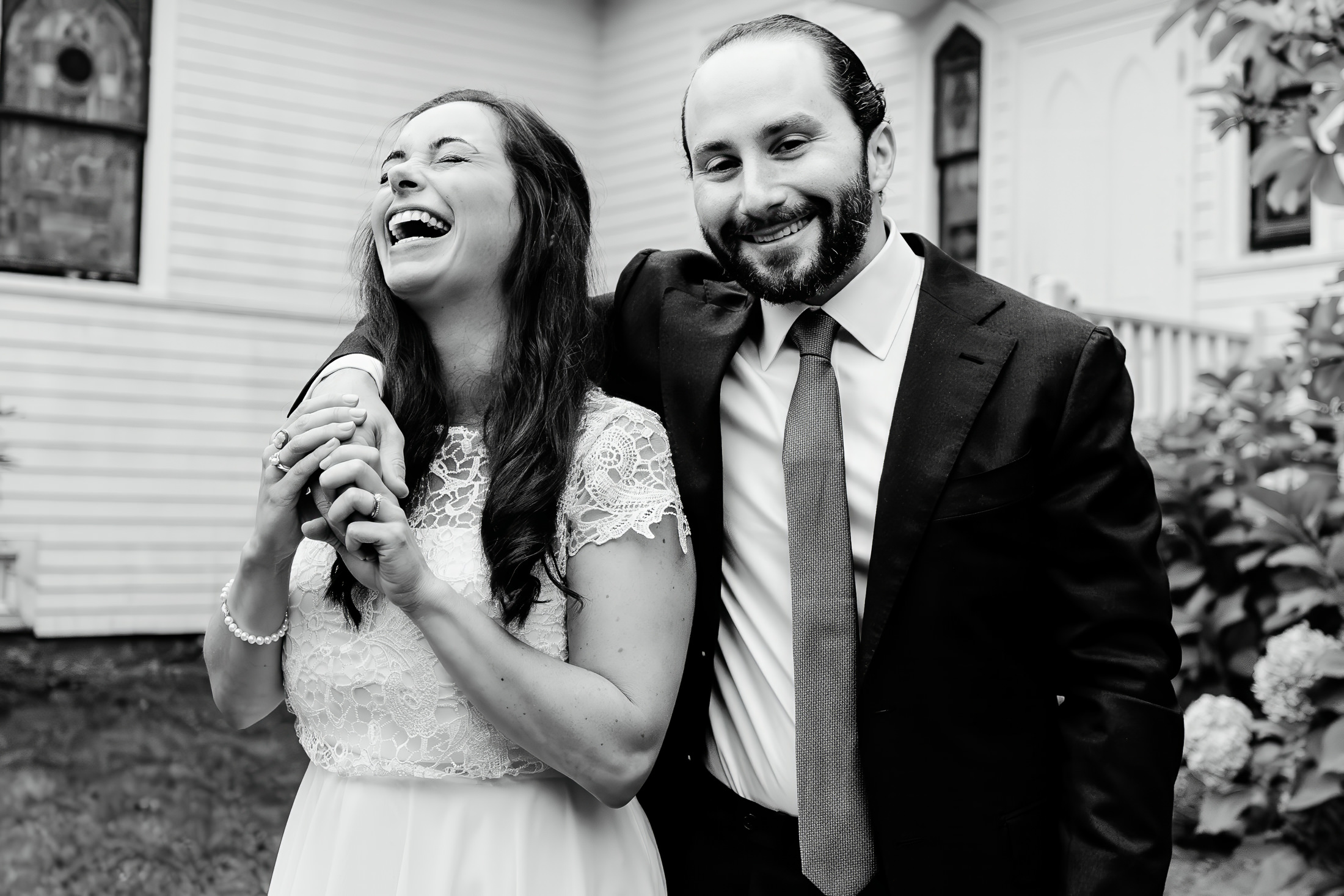 Couple laughing after their Camden Maine wedding ceremony