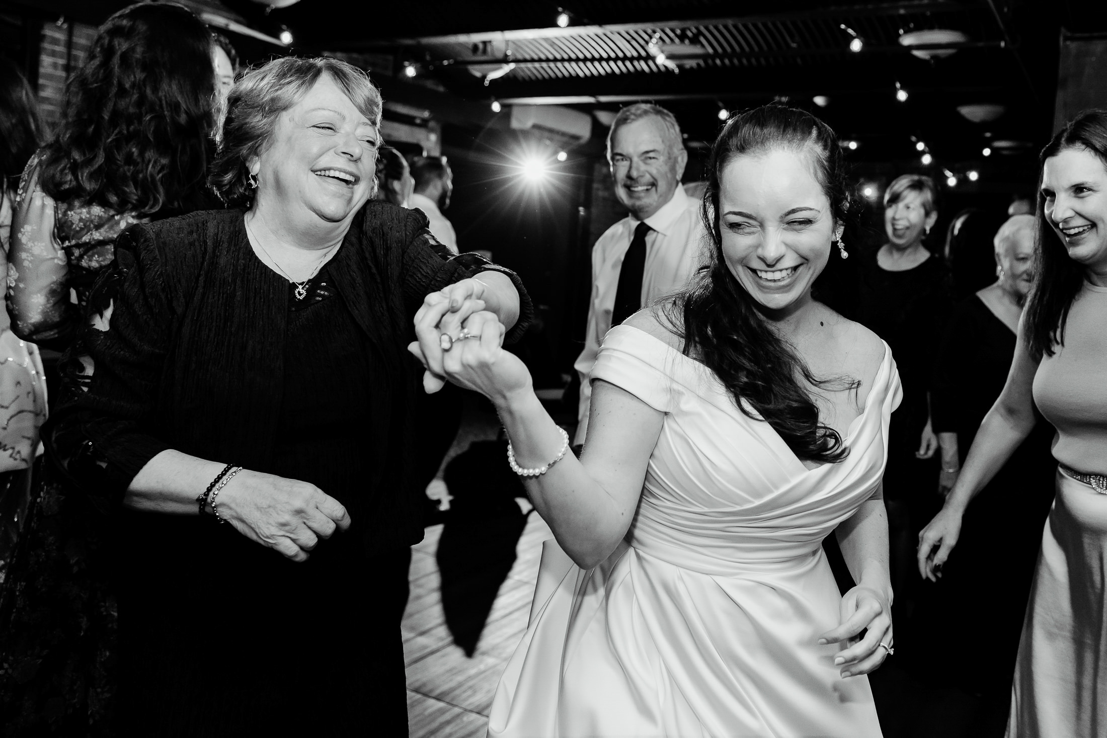bride dancing with her mom at Camden Maine wedding