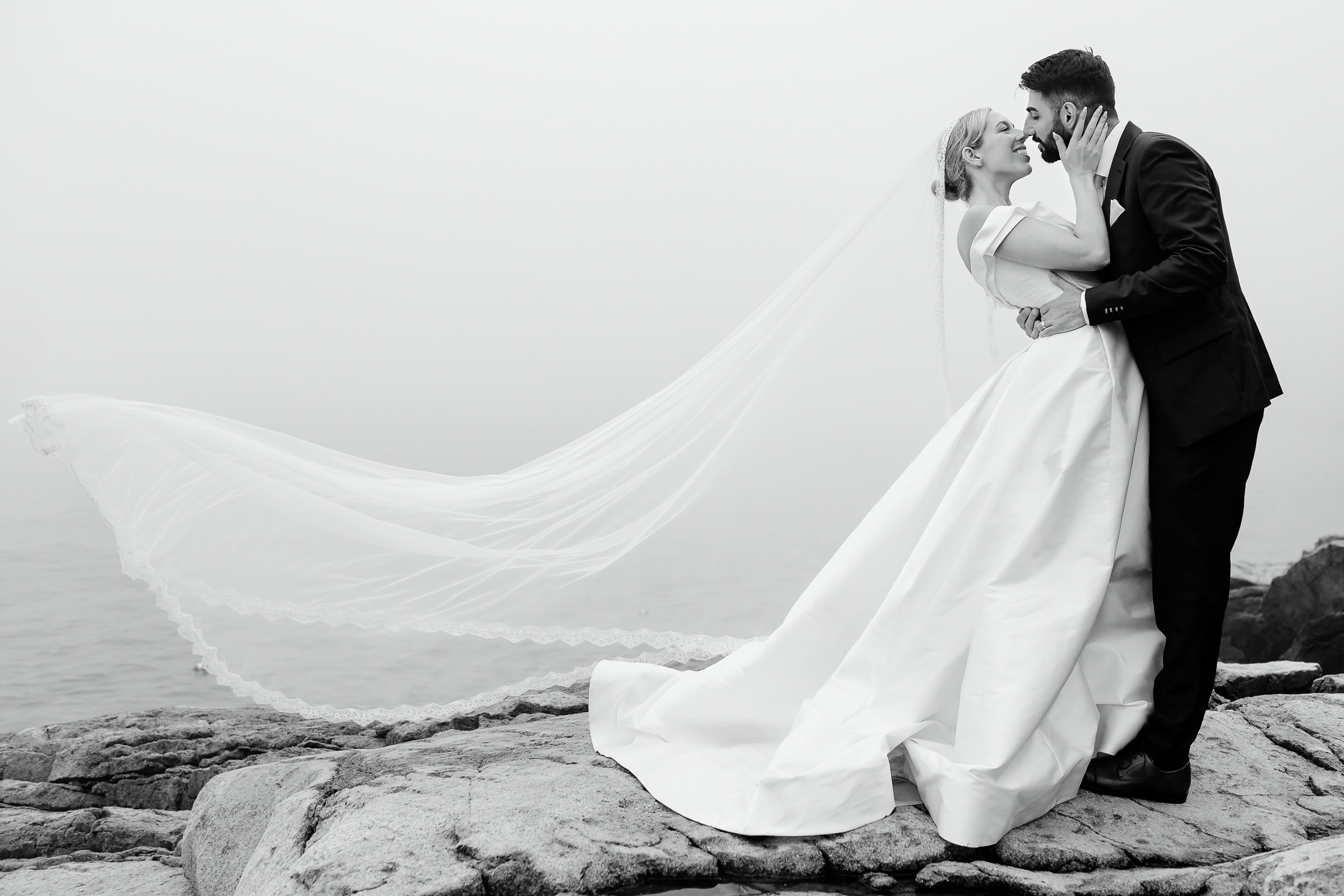 portrait of a couple kissing during Acadia National Park wedding portraits