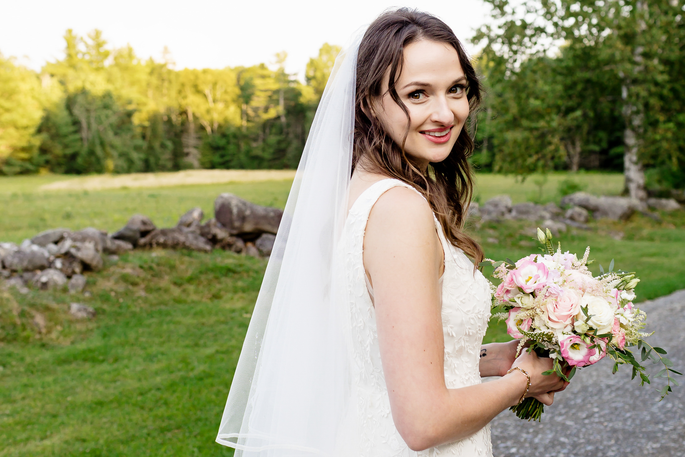 Portrait of a bride on her family farm during Monson Maine wedding