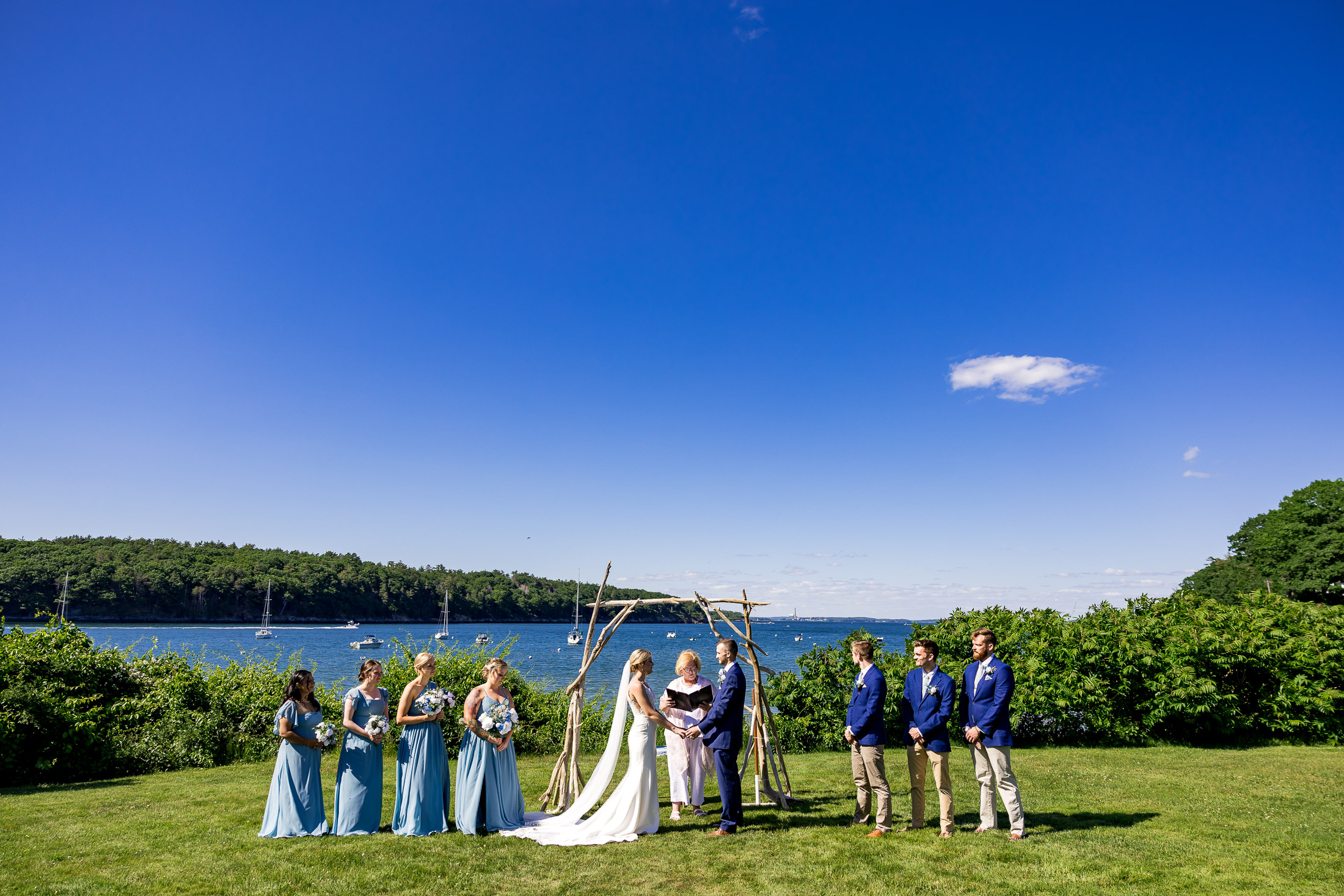 Wedding ceremony at TEIA Peaks Island wedding.